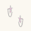Pair of silver star-shaped ear climbers with pink zirconia stones connected by delicate chains